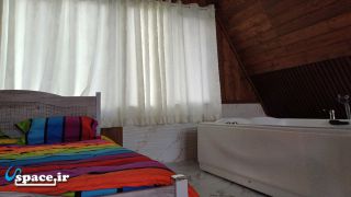 نمای داخلی اتاق خواب کلبه سوئیسی اشراف - تنکابن - روستای تقی آباد